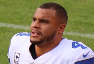 Head-and-shoulders portrait of Dak Prescott wearing a Dallas Cowboys jersey in 2017.